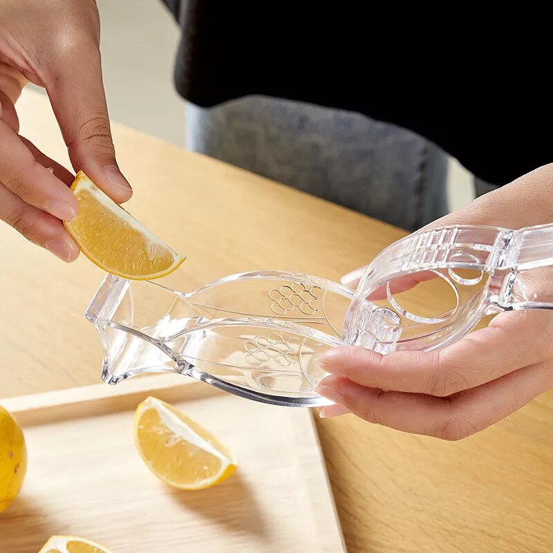 come4buy.com-Mini espremedor manual em forma de pássaro espremedor de limão transparente